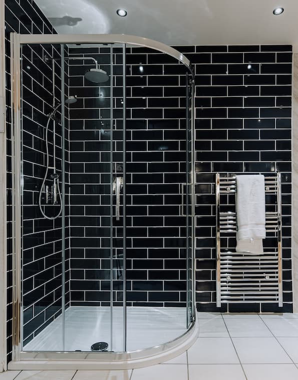 Black brick tiled wet room walk in shower