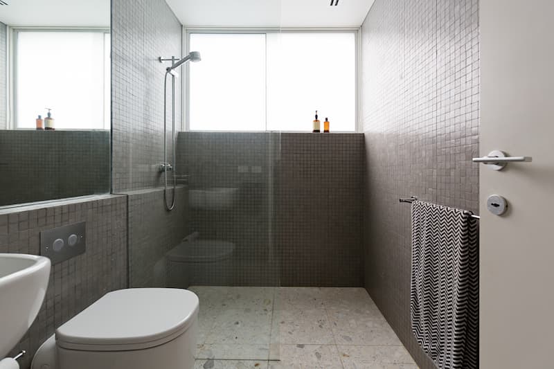 Modern walk in shower with mosaic full height tiles Wellington